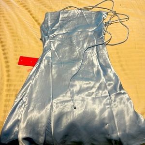 Beginning Boutique-Come and Get in Party Dress in light blue.